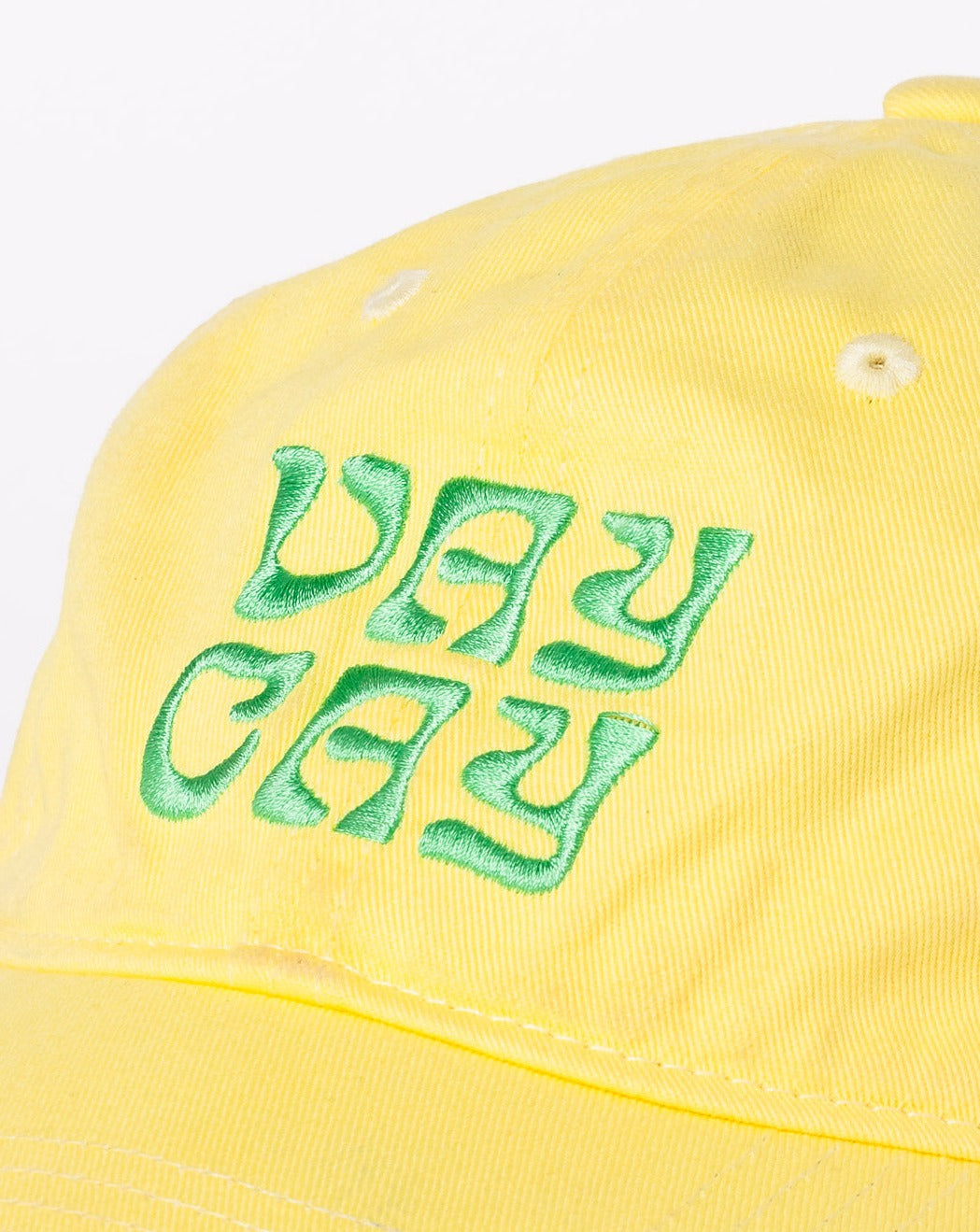 BELLARUCHI VAYCAY CAP YELLOW. Yellow Cap Green Writing. Yellow travel Cap. Travel Cap. Vacation Cap. Holiday Cap. Yellow Cap VAYCAY Writing. 