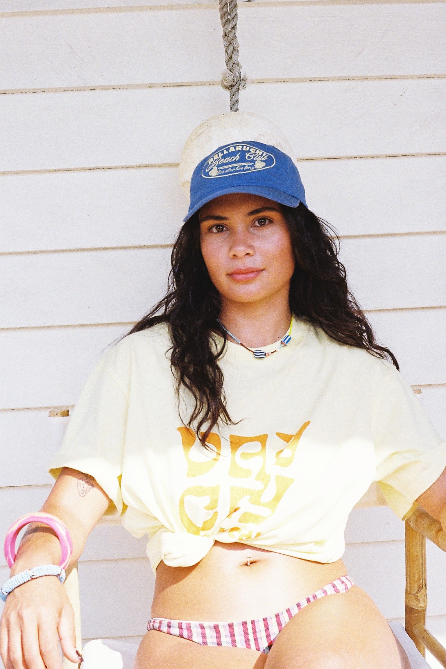 BELLARUCHI VAYCAY TEE YELLOW. Vaycay T-shirt. Yellow Vintage T-shirt. Vintage Vibe T-shirt. Mid weight t-shirt. Colourful Tshirt. Yellow Tee with Orange VAYCAY logo. BELLARUCHI Travel Tee. 